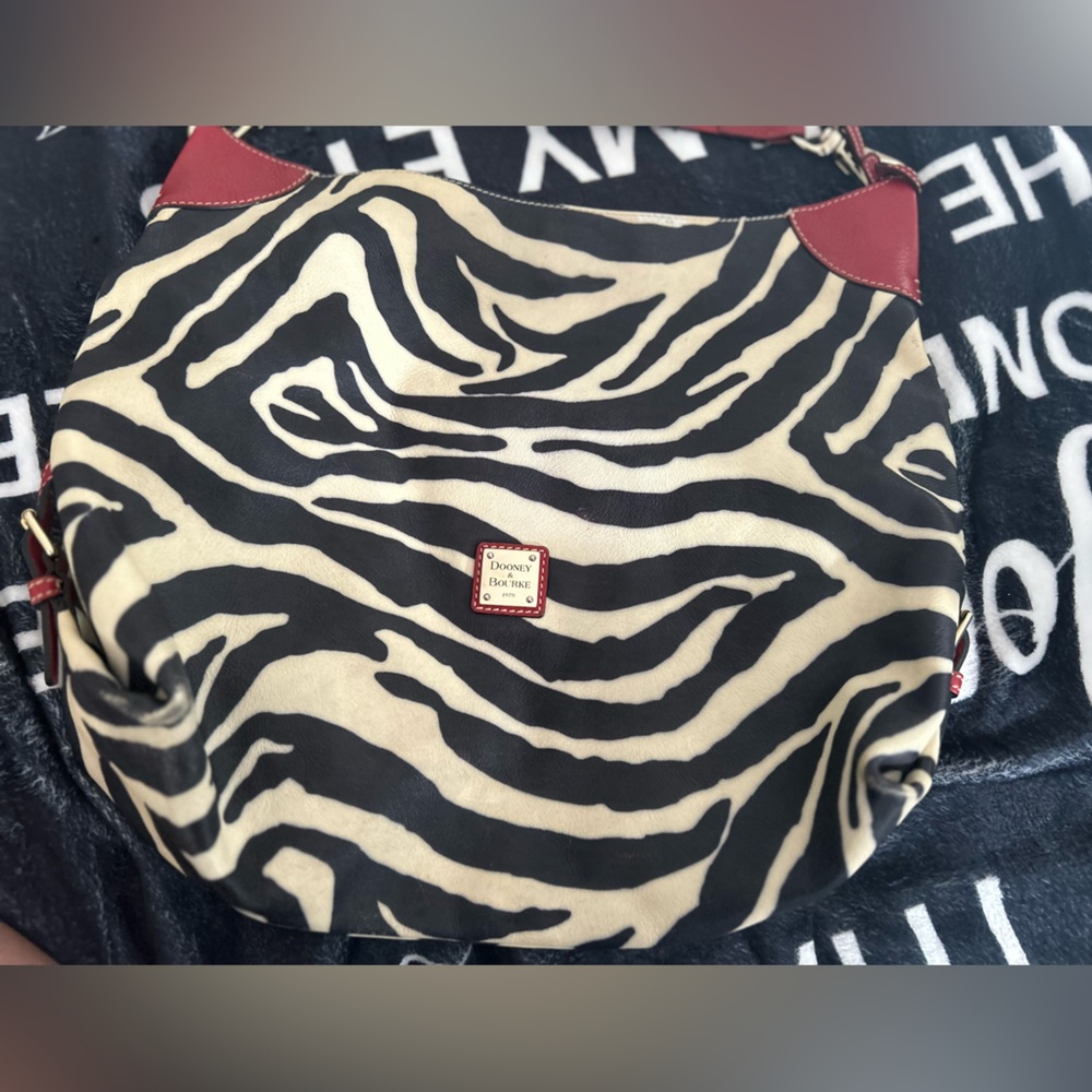 Zebra print Dooney & Bourke gently used